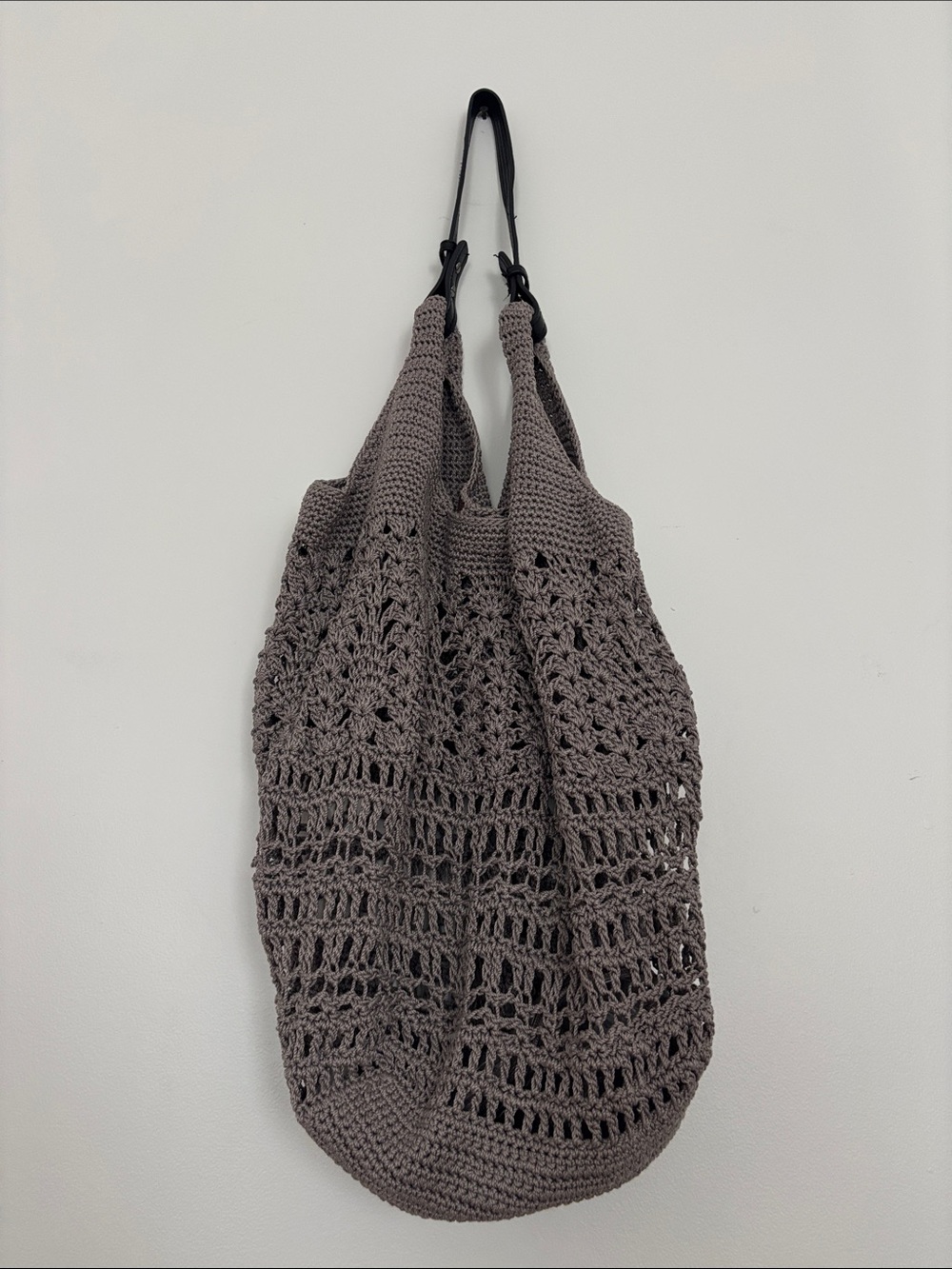The Sak Crochet Tote Bag in Taupe with Black Handles